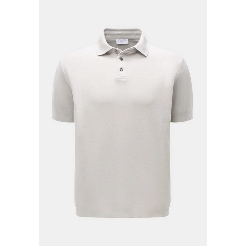 Grey polo shirt on a light gray background
