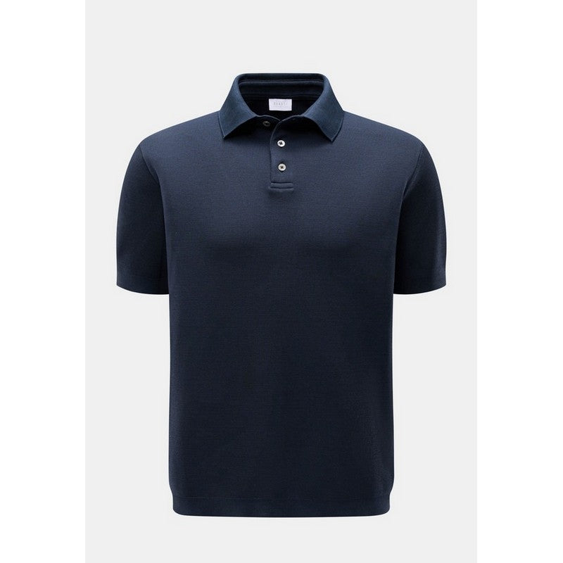 Navy blue polo shirt on a light gray background