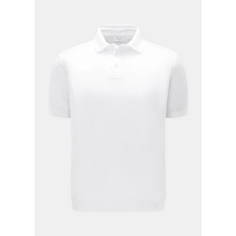 White polo shirt on a light gray background