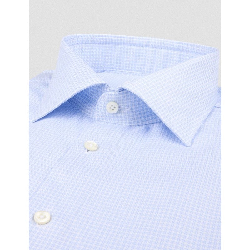 Light blue checkered shirt with white buttons on a light gray background