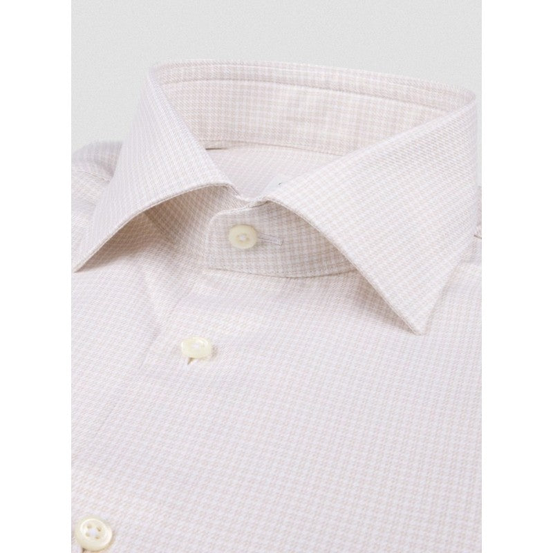 Close-up of a white dress shirt with a checkered pattern on a light gray background