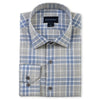 Folded blue and gray plaid shirt with Scott Barber label on a white background