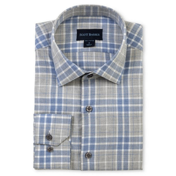Folded blue and gray plaid shirt with Scott Barber label on a white background