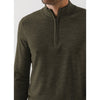 Green long-sleeve shirt with a quarter zip on a white background