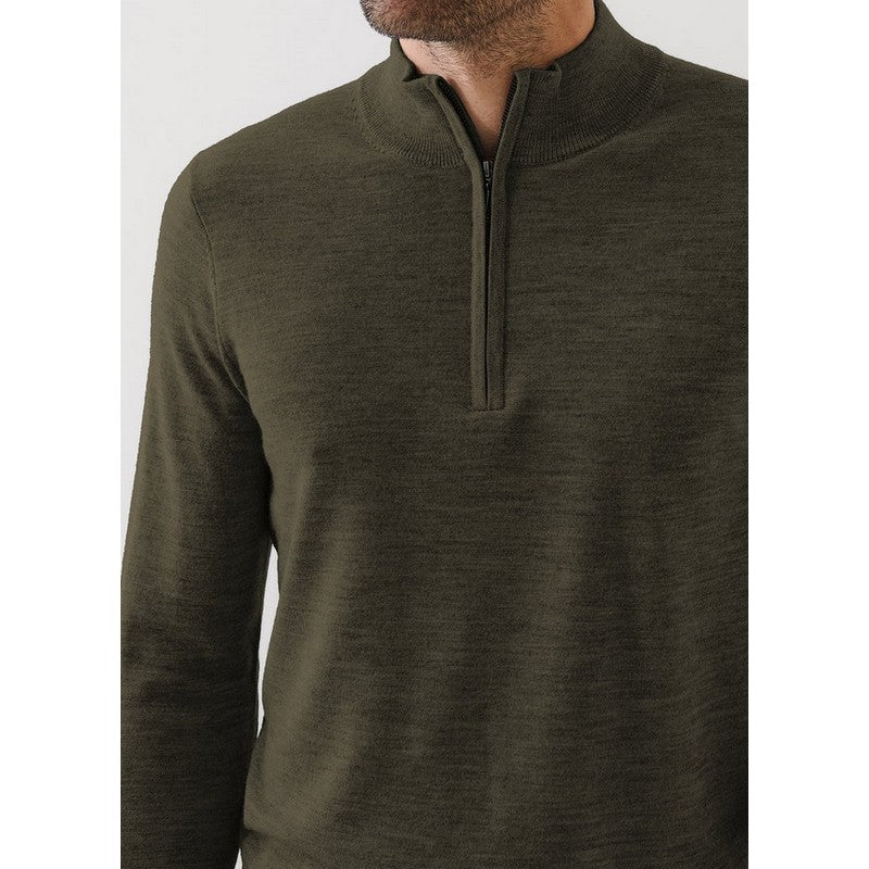 Green long-sleeve shirt with a quarter zip on a white background